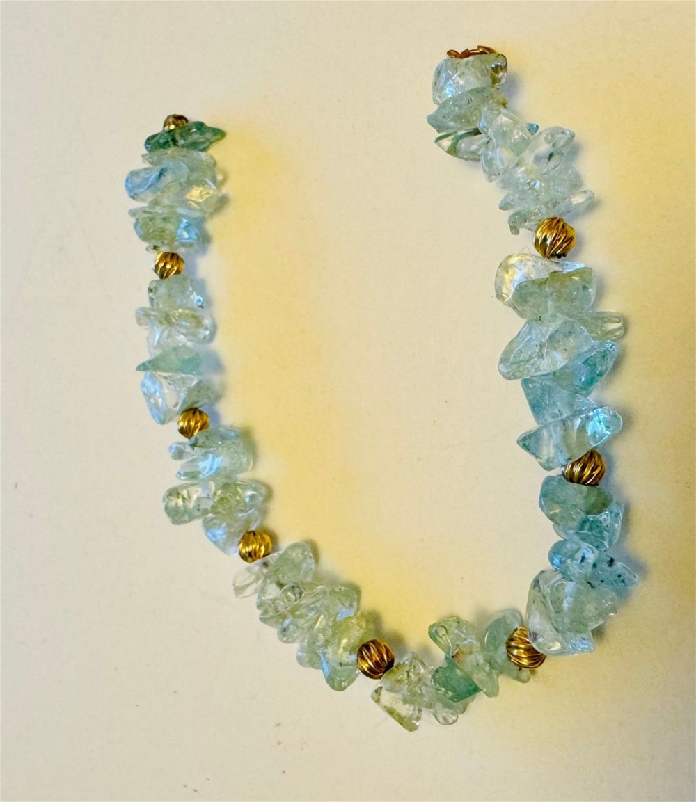 Lot 223: Aquamarine gold bead bracelet
