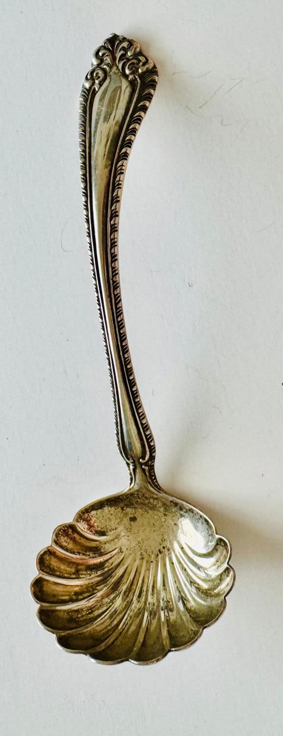 Lot 230: Sterling ladle fluted Victorian signed
