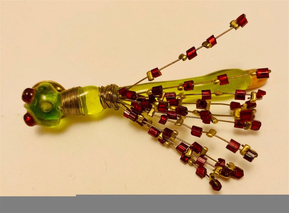 Lot 240: Bug pin with green body bug eyes