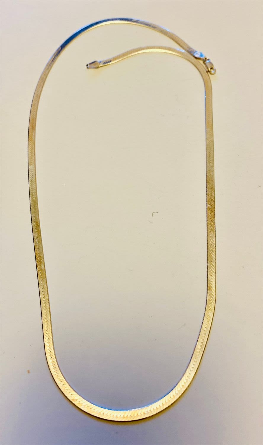 Lot 243: Sterling herringbone chain long
