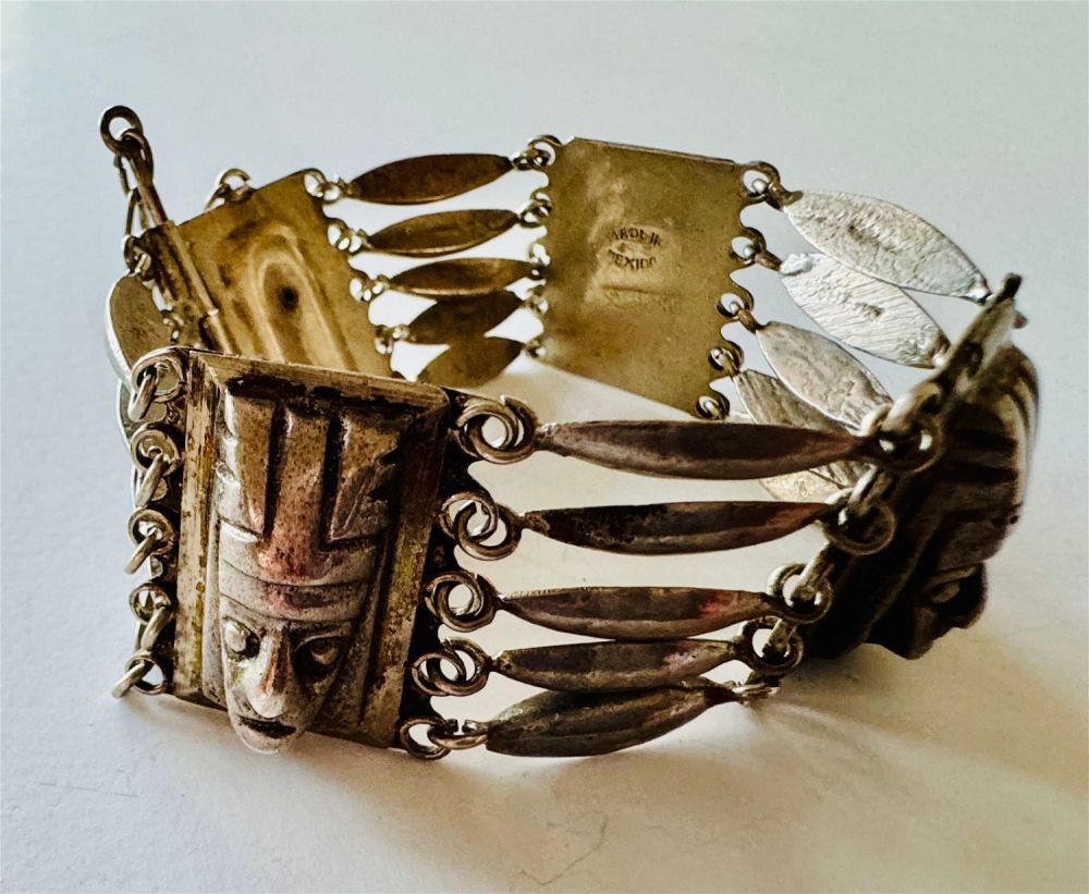 Lot 294: Sterling Mexican mask bracelet