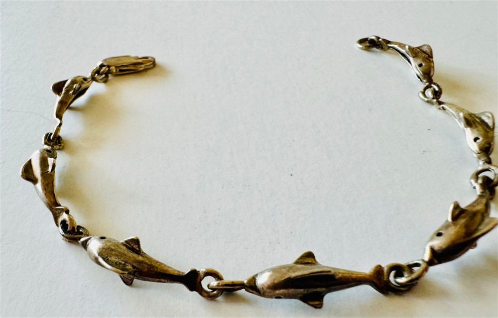Lot 303: Sterling dolphin vintage bracelet