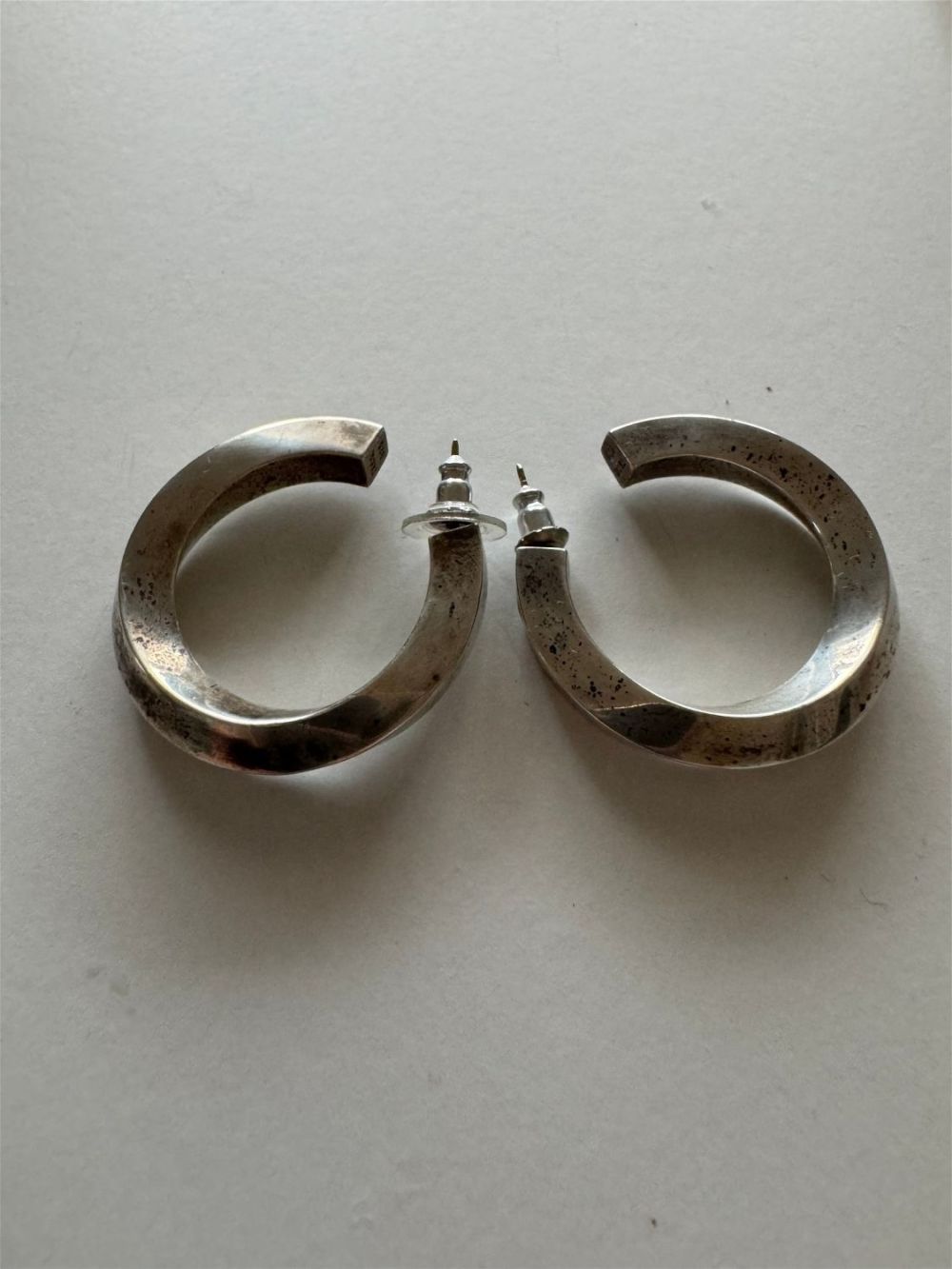 Lot 389: Sterling Tiffany hoop earrings.