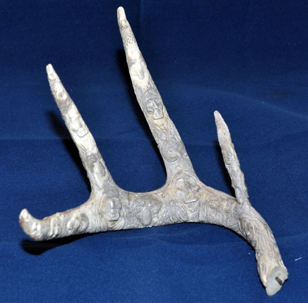 Lot 437: Antler American Indian carved with animals plus
