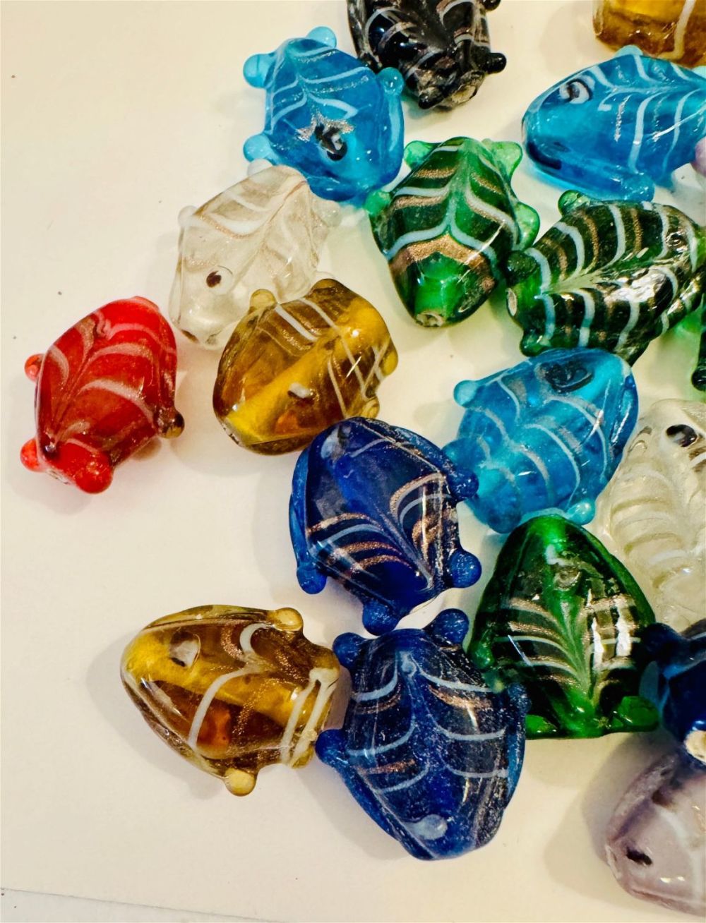 Lot 113: Fish blown glass beads multi color