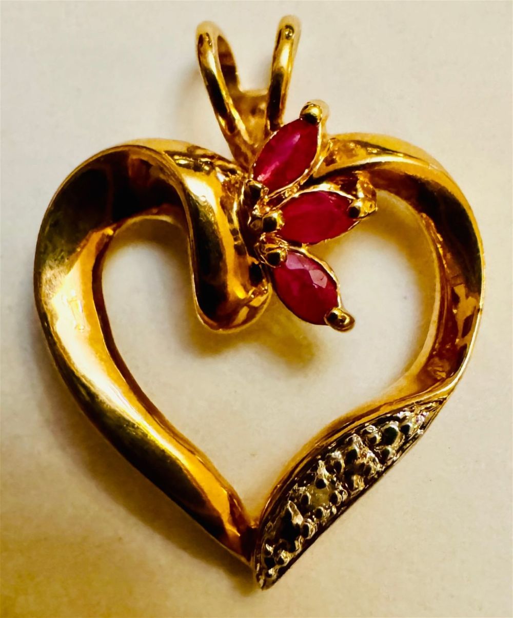 Lot 245: Vermeil heart ruby pendant