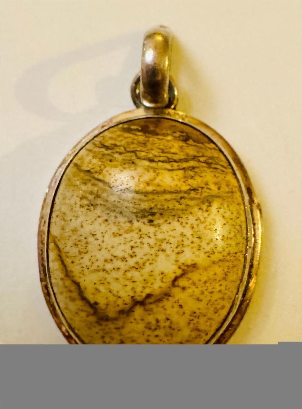 Lot 273: Sandstone cabochon vintage sterling pendant.