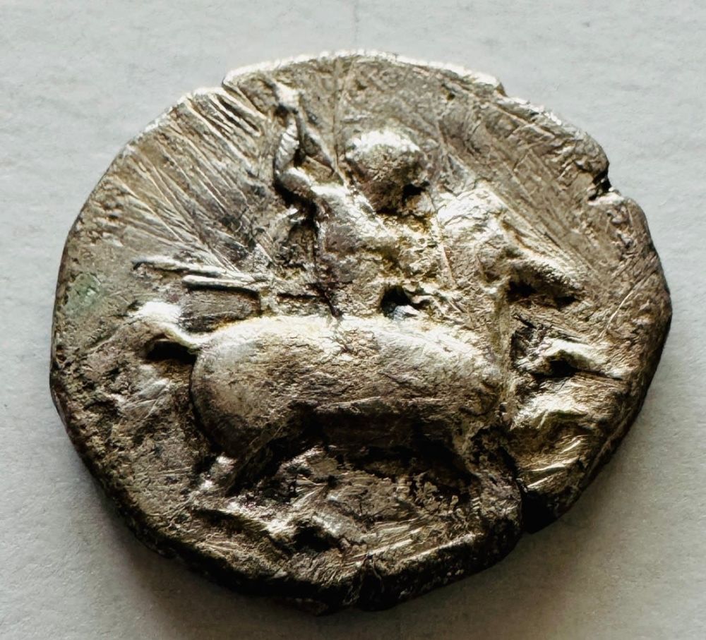 Lot 286: Taras riding dolphin ancient silver coin