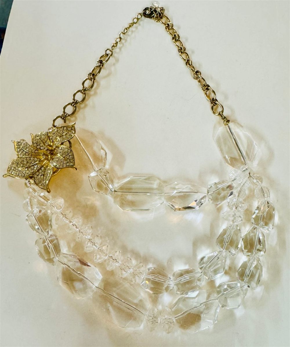 Lot 429: Clear stone triple necklace with flower set with rhinestones