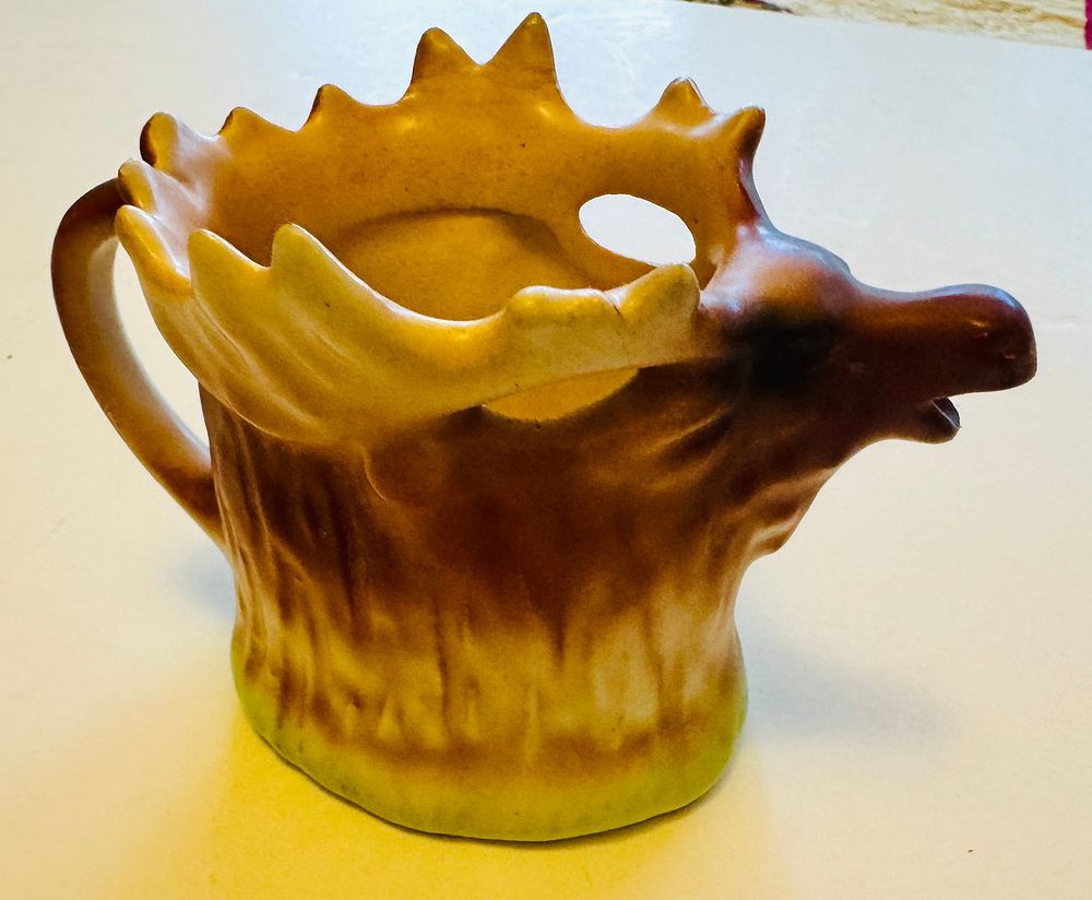 Lot 268: Moose cream pitcher vintage