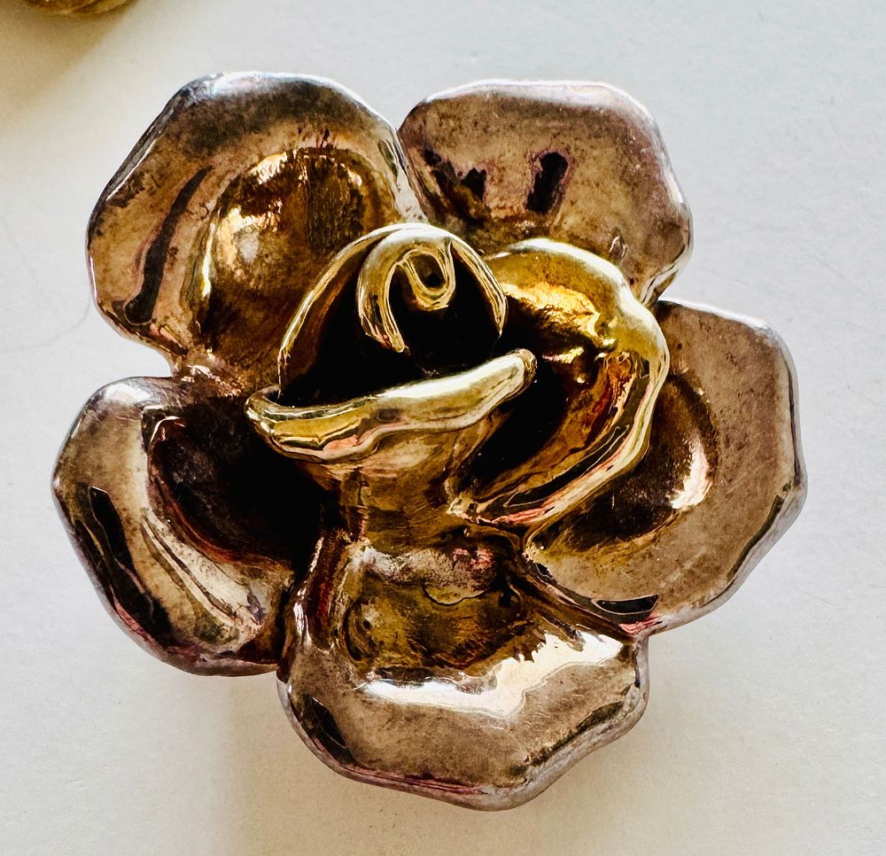 Lot 302: Sterling rose antique pin marked