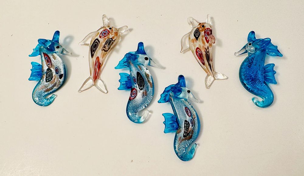 Lot 324: Seahorse glass pendant collection