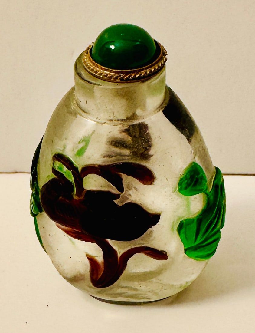 Lot 327: Peking glass bottle clear to green/dark purple