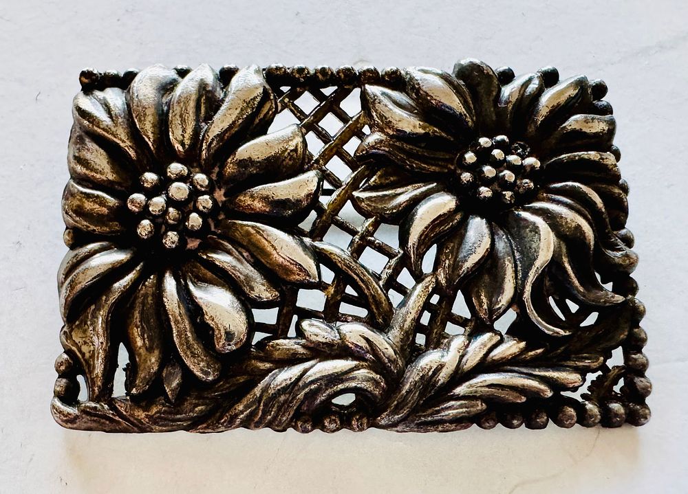 Lot 333: Antique rectangular pin with flowers