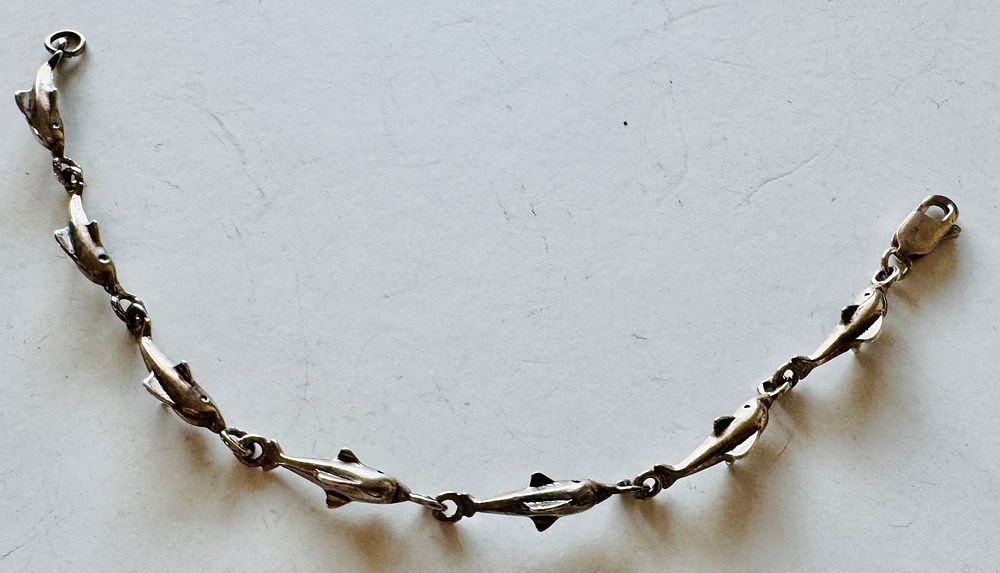 Lot 337: Sterling dolphin bracelet lobster clasp