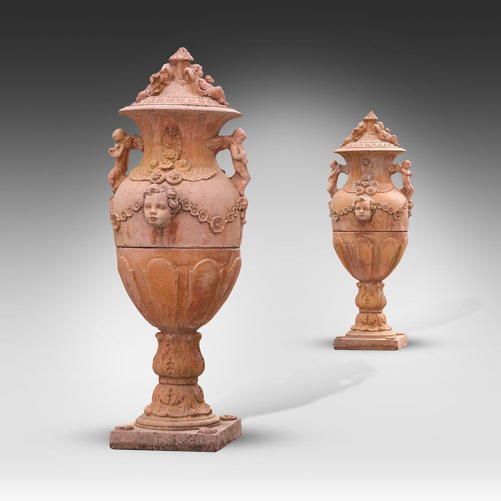 An impressive pair of Swedish-style composition stone covered urns 169 x 67 x 74 cm. (66.5 x 