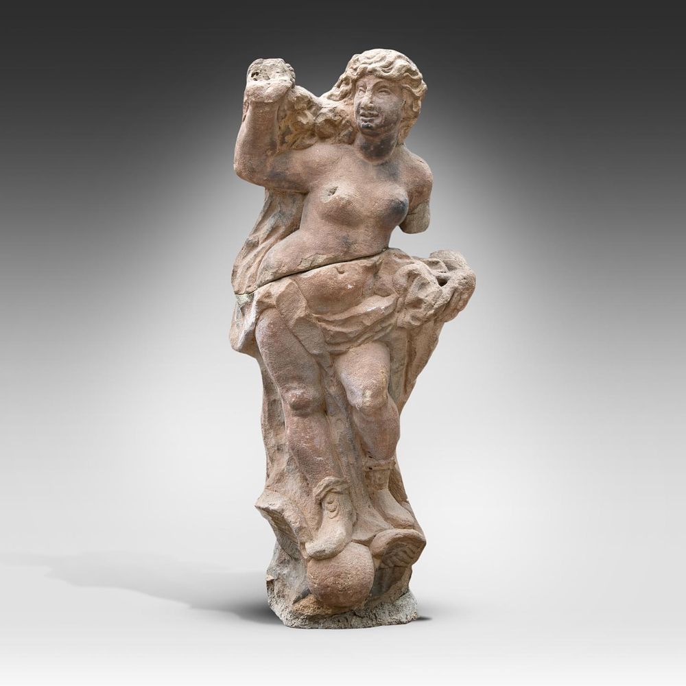 A sandstone garden sculpture of a goddess 89 x 35 x 29 cm. (35.0 x 13.7 x 11.4 in.). A 