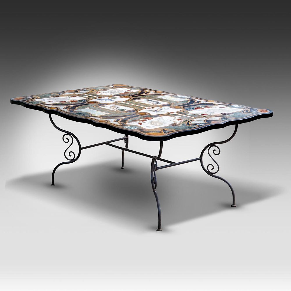 A large Italian pietra dura table, decorated with various birds, on a wrought iron base 75 x 