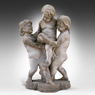 A sandstone sculpture of playing children 121 x 73 x 52 cm. (47.6 x 28.7 x 20.4 in.). A 