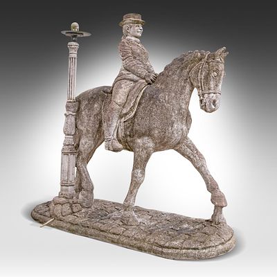 A large composite stone garden lantern with the sculpture of a rider on horseback 165 x 178 x 
