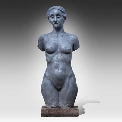 A composite stone figure of a female torso 113 x 47 x 35 cm. (44.4 x 18 1/2 x 13.7 in.). A 