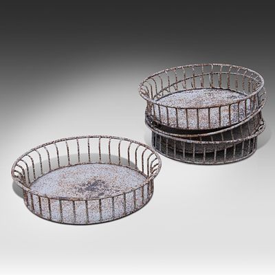 A set of four cast iron garden baskets 18 x 79 cm. (7.0 x 31.1 in.). A set of four cast iron 