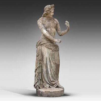 A composite stone garden figure of Apollo 142 x 57 x 46 cm. (55.9 x 22.4 x 18.1 in.). A 