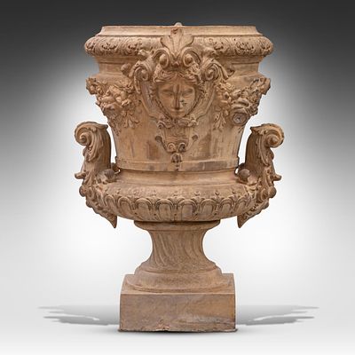 A Neoclassical composite stone garden urn 74 x 58 x 50 cm. (29.1 x 22.8 x 19.6 in.). A 
