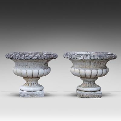 A pair of composite stone garden urns 47 x 54 cm. (18 1/2 x 21.2 in.). A pair of composite 