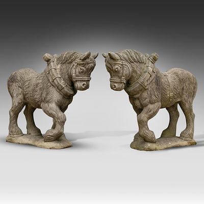 A pair of stone garden sculptures of draft horses 112 x 133 x 38 cm. (44.0 x 52.3 x 14.9 in.). A 