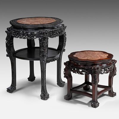 A large Chinese carved hardwood stand and a smaller one, both inset with marble tops, late Qing 