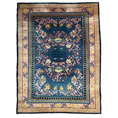 A very large Chinese 'Scrolling Lotus' woollen rug, Qing dynasty 314 x 481 cm. (123.62 x 189.37 in.)