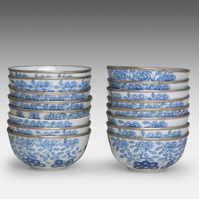 A series of sixteen Chinese blue and white 'Peony Garden and Poem' dinner bowls for the 