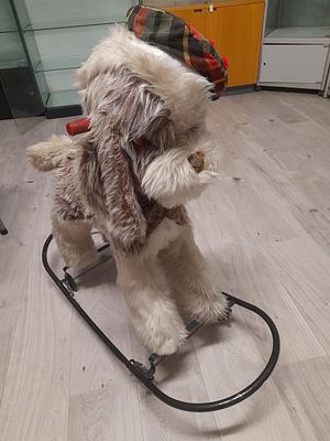 large vintage child's Scotty dog on wheels or as a rocker. aprox. 90cm tall