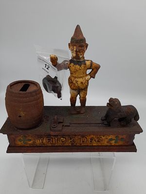 "Trick Dog" caste iron money box, requires attention