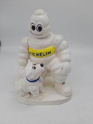 Michelin Man and Dog cast iron figures aprox.20cm tall