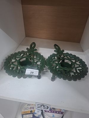 pair cast iron trivet candle holders