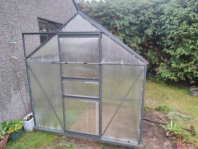 one season used greenhouse with boxes and papers UNABLE TO POST