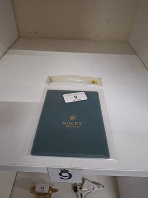 green book with gold leaf inlay