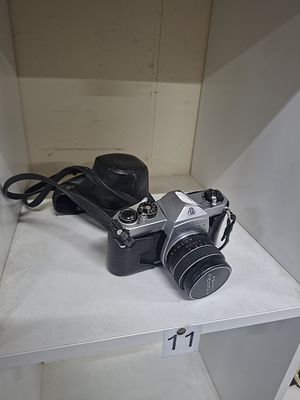 cased pentax ashani SP1000