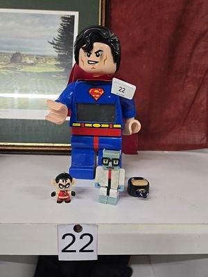superman clock needs attention
