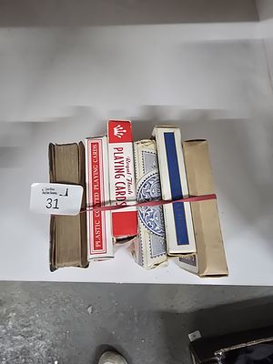 A Collection of Vintage Playing Cards and a Small Volume