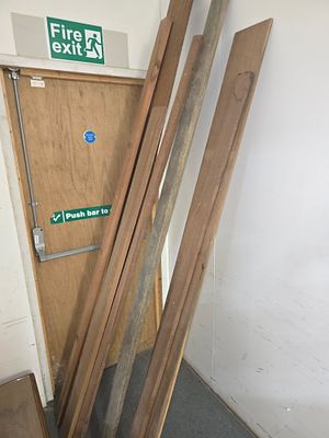 A Collection of Reclaimed Hardwood Planks and Moulded Timber Sections