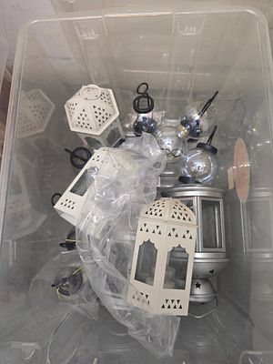 An Assortment of Contemporary Decorative Metal Lanterns and Glass Ornaments
