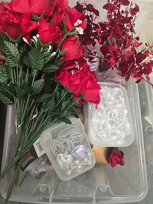 An Assortment of Artificial Floral Stems and Decorative Craft Items