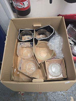 A collection of clear glassware including a cut glass bowl