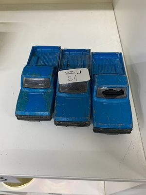 Three Corgi Mazda B1600 Pickup Trucks