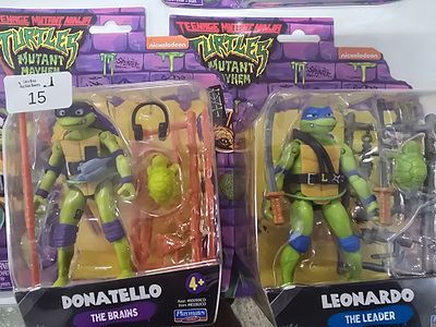 A Pair of Playmates Teenage Mutant Ninja Turtles Mutant Mayhem Action Figures