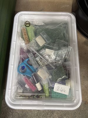 A Collection of Glass Seed Beads and Craft Tools including Swarovski Elements