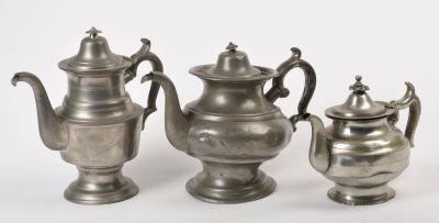 Two American Pewter Teapots, and a Coffeepot. Coffee pot by Bailey &amp; Putnam, height 9.5 
